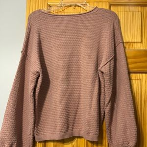 Mauve colored boutique sweater with dot details